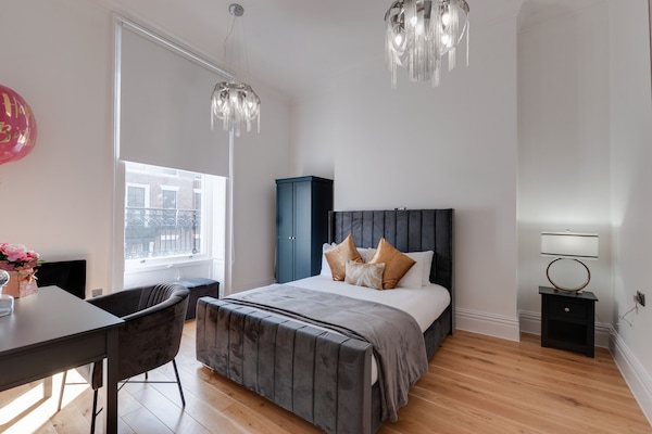 Blackout curtains, iron/ironing board, free WiFi, bed sheets