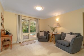TV, fireplace, books, offices
