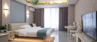 Xingwoli Hotel Apartment (Guangzhou Luogang Wanda Plaza Suyuan Subway Station)