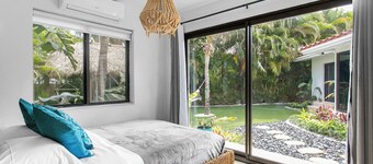 EAST of A1A WITH Private Beach Guest house, Heated Pool, AND 6 seater Golf Cart!