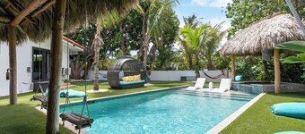 EAST of A1A WITH Private Beach Guest house, Heated Pool, AND 6 seater Golf Cart!