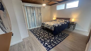 1 bedroom, desk, iron/ironing board, travel crib