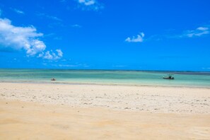 On the beach, white sand, 20 beach bars