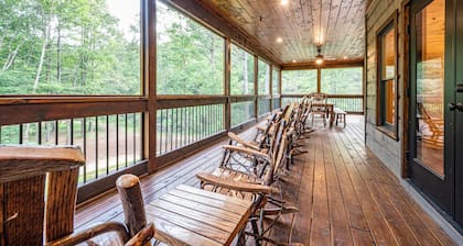 Custom built mountain house on trout stream with tons of privacy & hot tub.