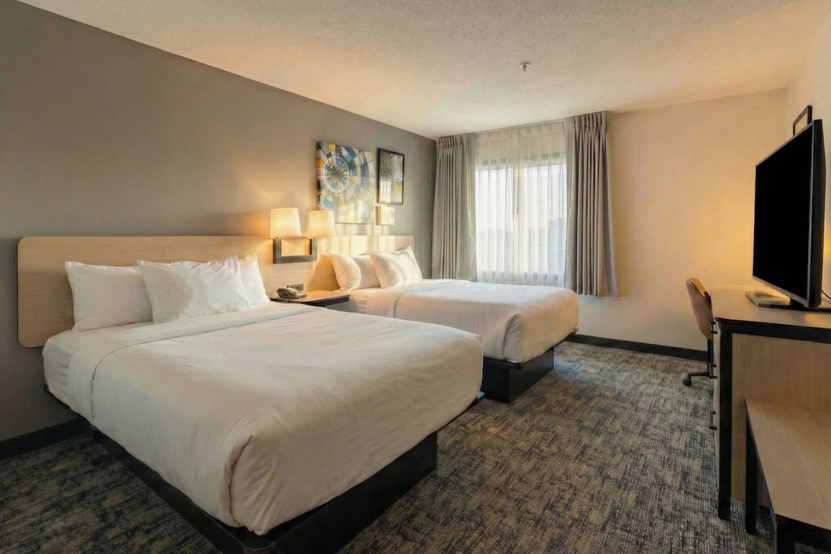 Deluxe Double Room, 2 Queen Beds, Non Smoking | Desk, laptop workspace, blackout curtains, soundproofing