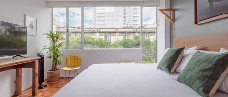 1 bedroom, desk, iron/ironing board, travel cot