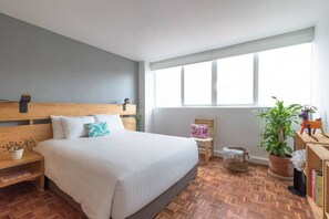 1 bedroom, desk, iron/ironing board, travel crib