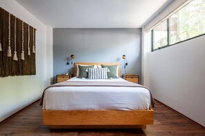 1 bedroom, desk, iron/ironing board, travel crib