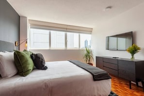 1 bedroom, desk, iron/ironing board, travel cot