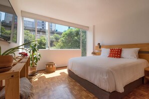 1 bedroom, desk, iron/ironing board, travel crib