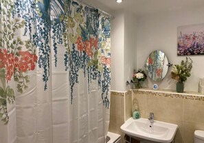 Hair dryer, towels, soap, shampoo