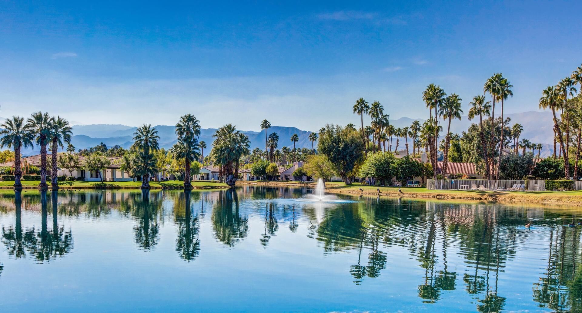 Ultra modern luxury condo with golf course, lake & mountain views.