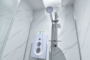 Comfort Double Room | Bathroom | Shower, hair dryer, towels, soap