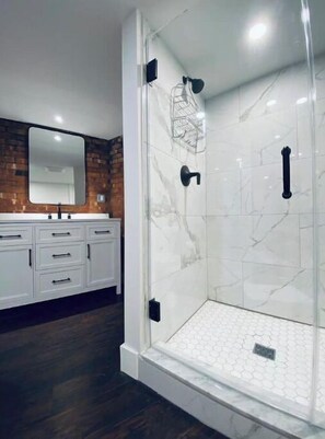 Shower, hair dryer, towels, soap