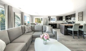 Deluxe Apartment | Living area | 50-inch Smart TV with cable channels, TV, DVD player - High Point Guesthouse (Seattle)