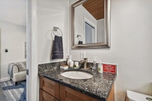 Bathtub, hair dryer, towels