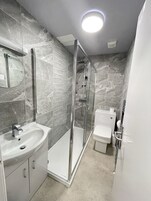 Hair dryer, towels, soap, shampoo
