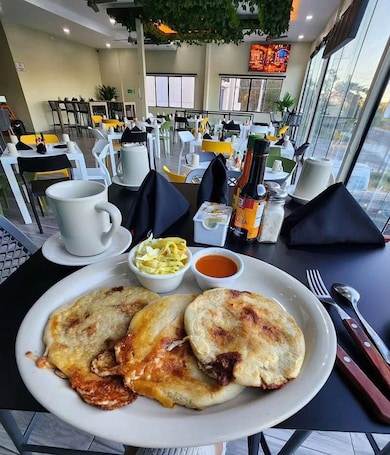 Free daily cooked-to-order breakfast. Mi Tierra Aeropuerto Hotel y Restaurante