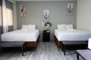 Chambre triple familiale | Literie de qualité, accès au Wi-Fi (inclus), literie fournie