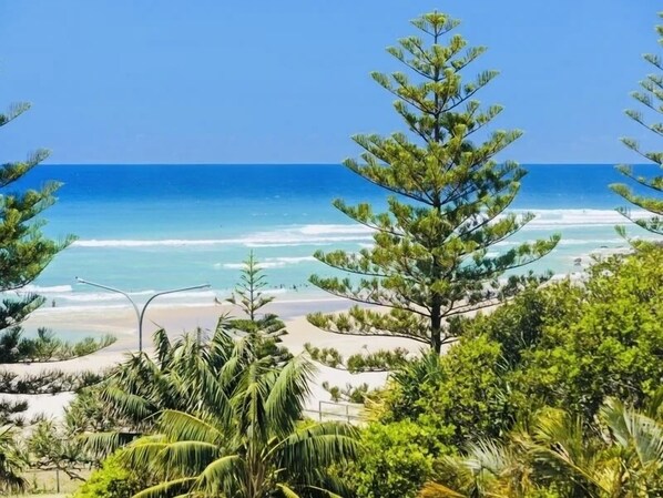 On the beach, sun-loungers, beach towels