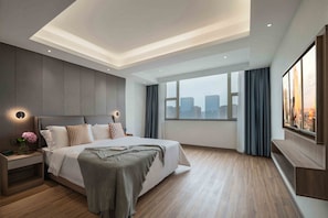 A modern hotel room with a large bed, a nightstand, a TV, and a city view. - Citadines Zhengda Mall Hefei (Hefei)