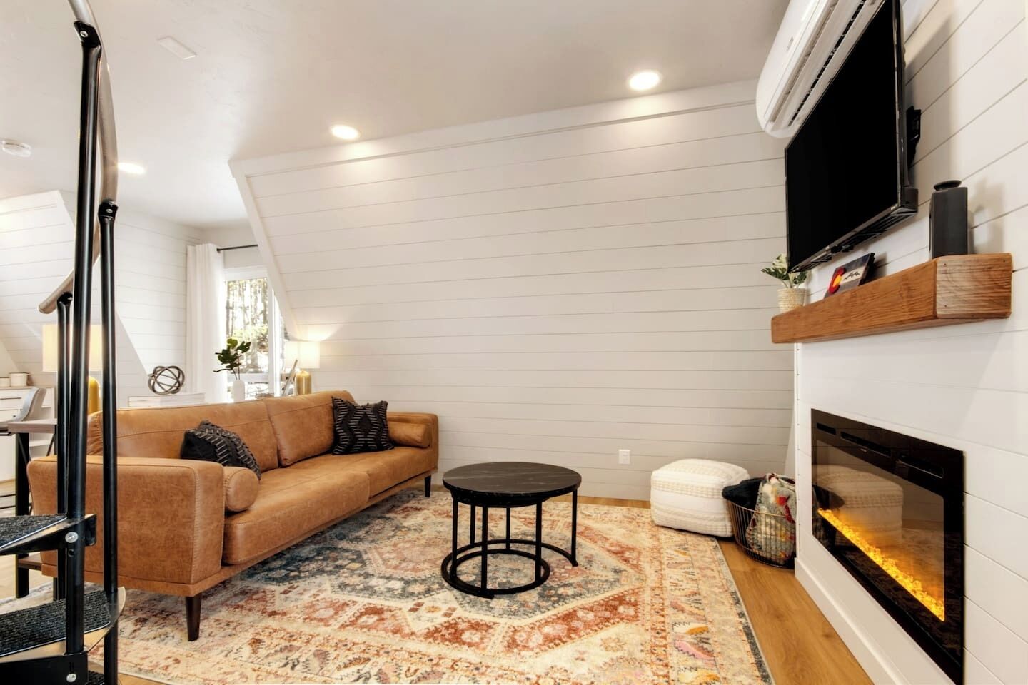 Smart TV, fireplace, books