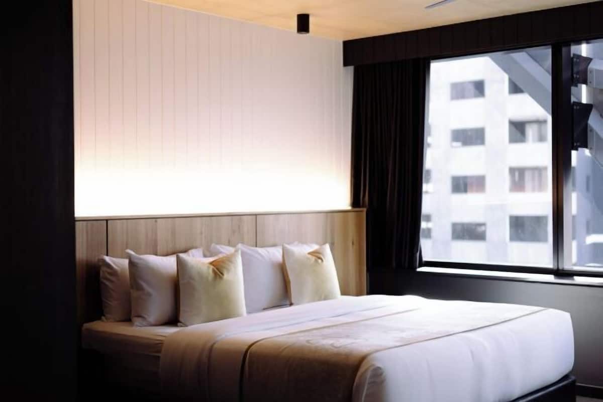 Premium bedding, pillowtop beds, desk, laptop workspace