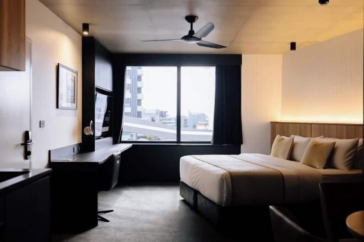 Premium bedding, pillowtop beds, desk, laptop workspace