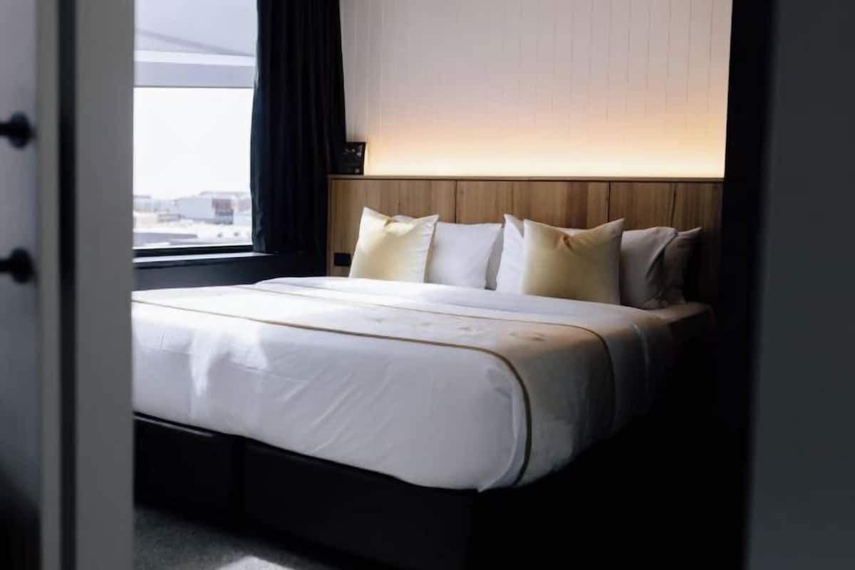 Premium bedding, pillowtop beds, desk, laptop workspace