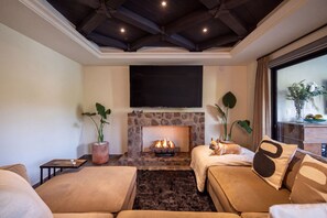 Luxury House | Living area | 50-inch Smart TV with digital channels, TV, fireplace