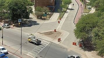 A street intersection with a brick building labeled "Valiant."
