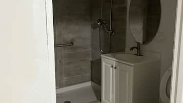Shower, towels, toilet paper