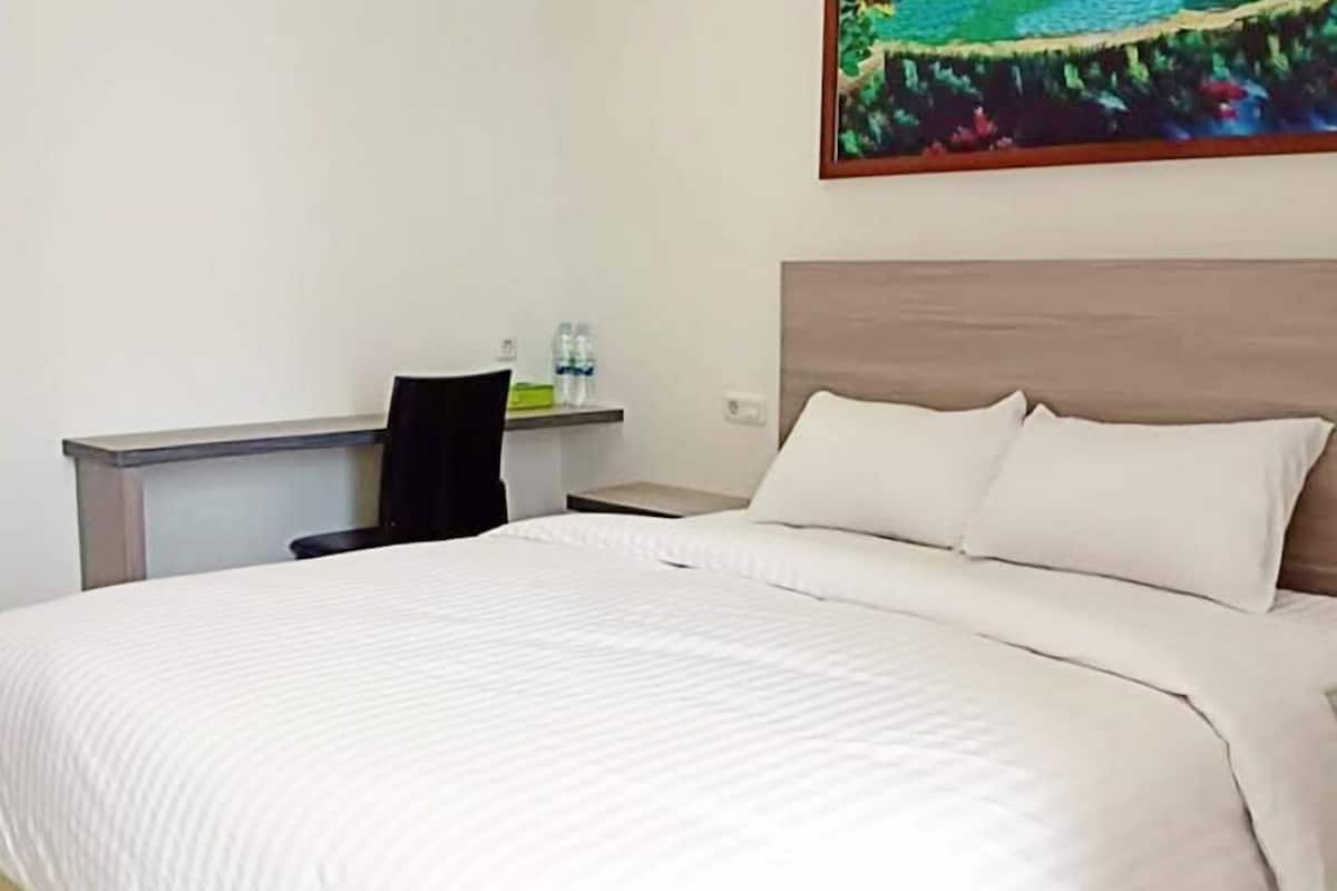 Habitación Deluxe doble | Escritorio, wifi gratis, ropa de cama