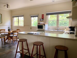 Classic Cottage | Private kitchen | Microwave, stovetop, coffee/tea maker, electric kettle