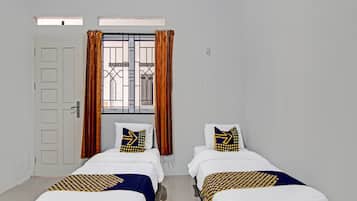 Habitación básica con 2 camas individuales | Ropa de cama