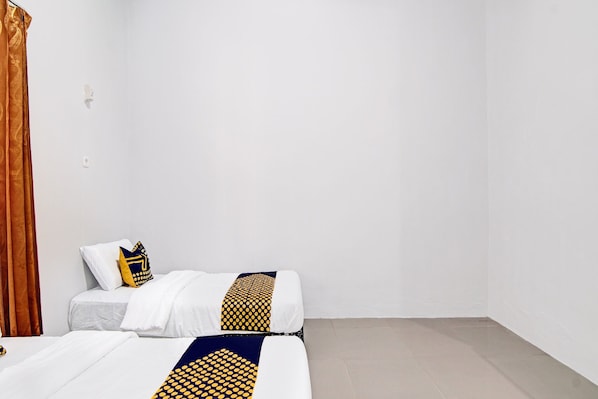 Chambre avec lits jumeaux | Draps fournis