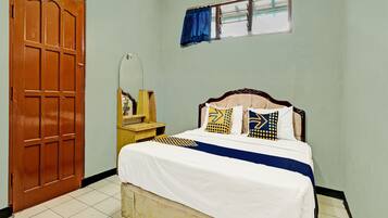 Desk, laptop workspace, blackout curtains, bed sheets