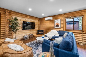 Smart TV, fireplace, DVD player, foosball
