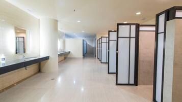 Shower, slippers, towels, soap