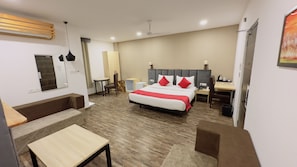 Premium Room | Desk, laptop workspace, blackout drapes, soundproofing - Ayaan Residency (Noida)