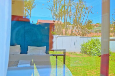 Spacious urban home with private pool in the backyard. 5 minutes from the beach.