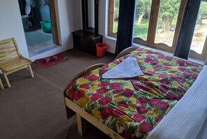 Desk, blackout drapes, bed sheets