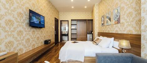 Chambre Deluxe, 1 grand lit | Minibar, coffres-forts dans les chambres, bureau