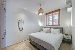 2 habitaciones, tabla de planchar con plancha y cuna de viaje 