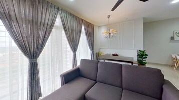 Economy Condo | Living area