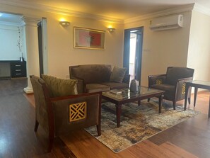 Apartment | Living area | 40-inch LED TV with satellite channels, TV -  Peach View Hotel and Apartments. (Accra)