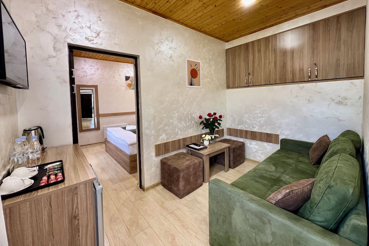 Habitación familiar | Ropa de cama de alta calidad y edredones de plumas