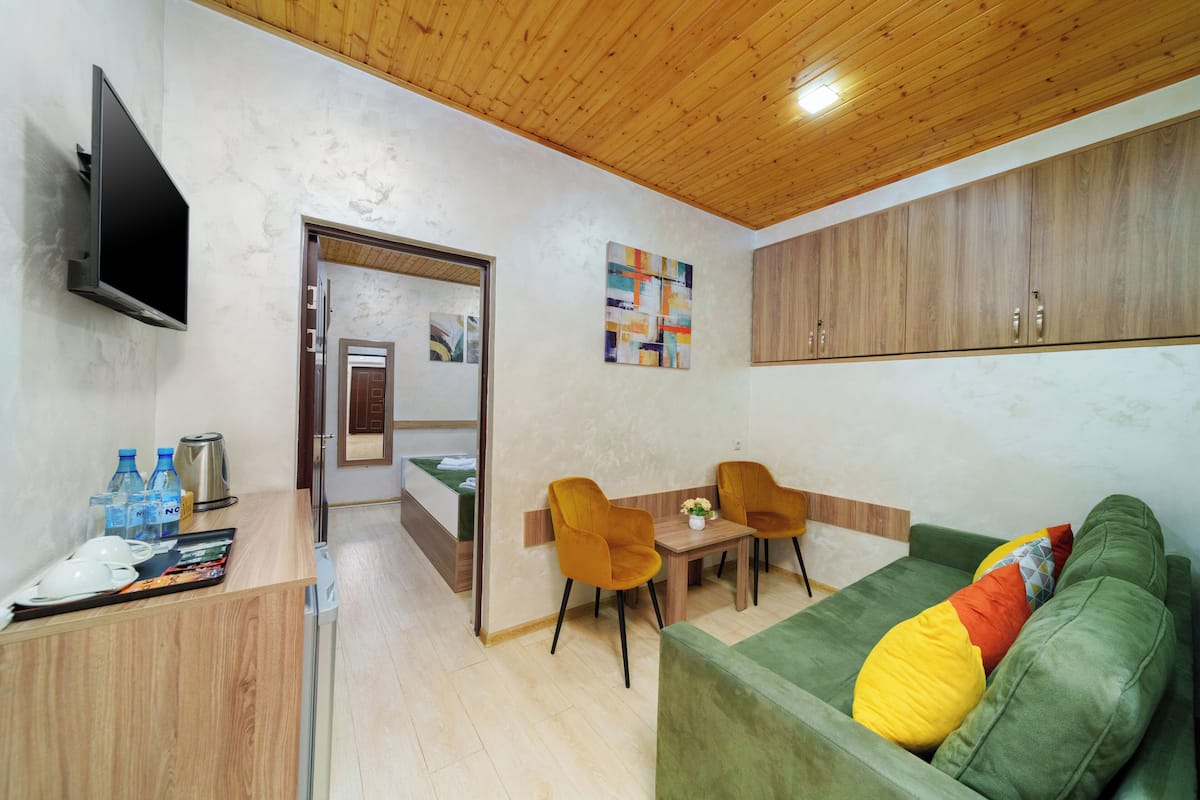 Family Room | Premium bedding, down comforters, pillowtop beds, minibar