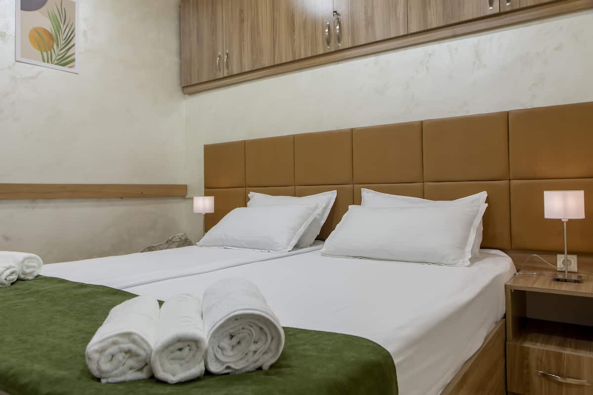 Luxe beddengoed, donzen dekbedden, pillowtop-bedden, een minibar