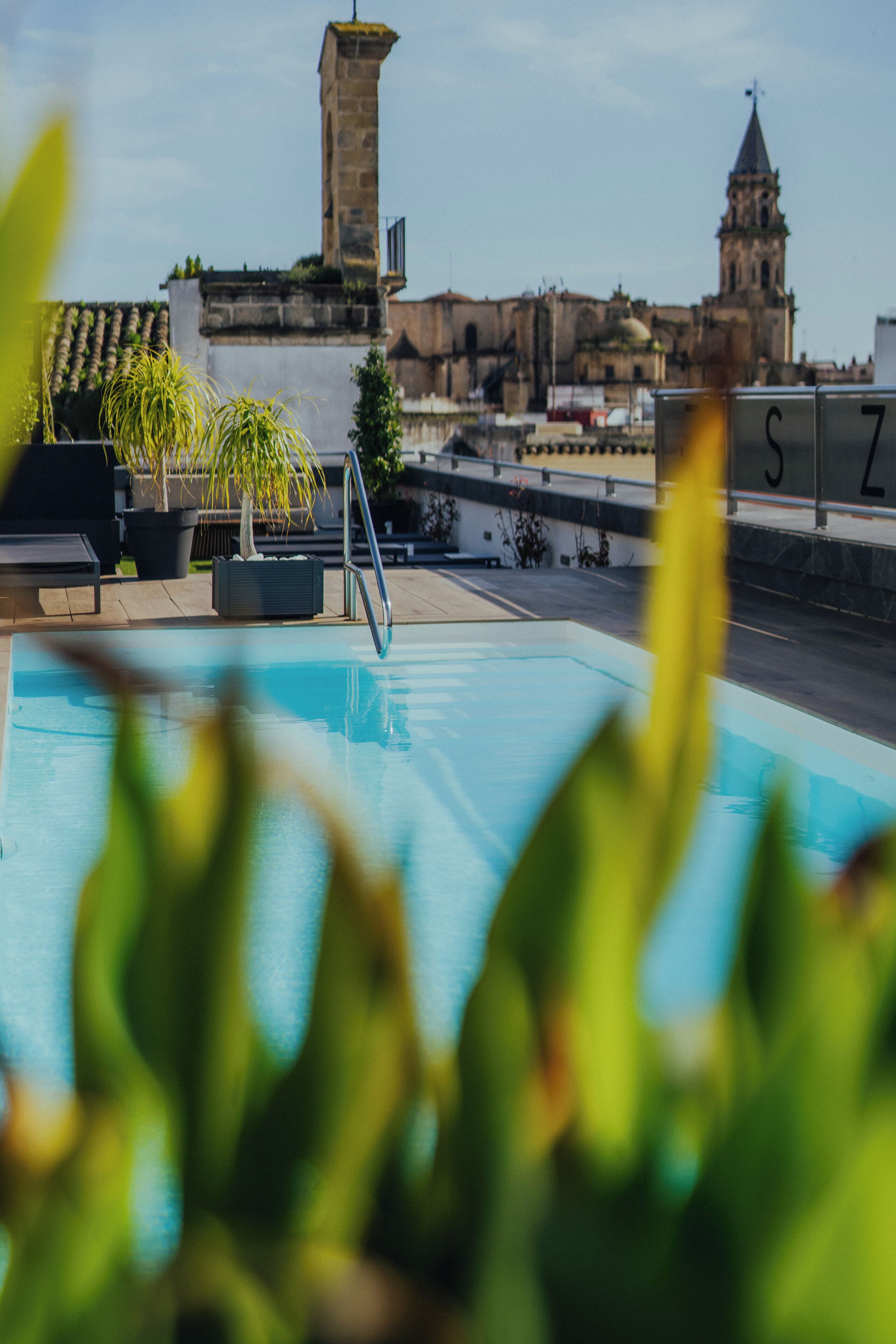 Seasonal outdoor pool, open 9:30 AM to 7:30 PM, pool umbrellas